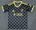 27/28 Liverpool away fan jersey front view in black and yellow