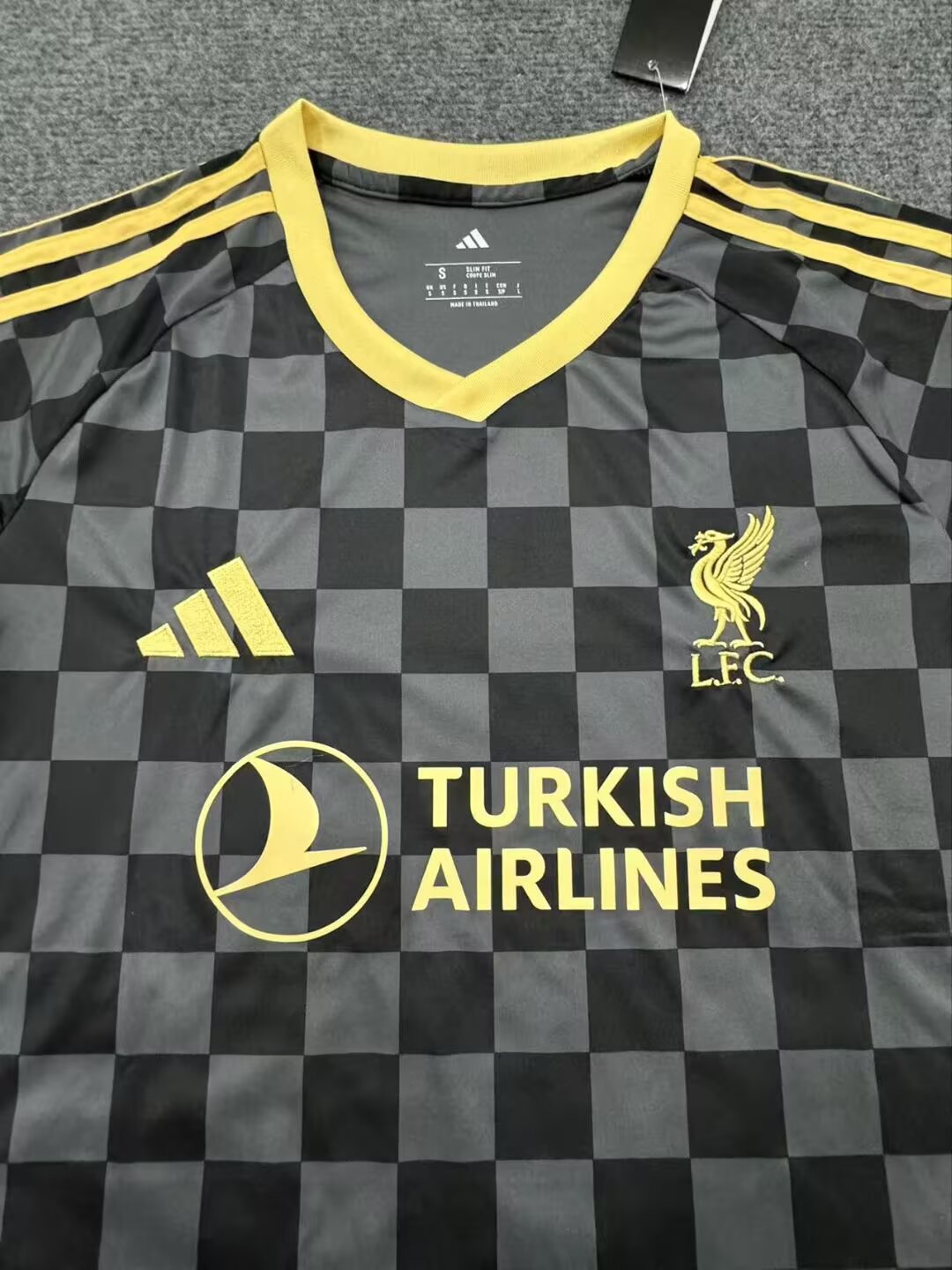 27/28 Liverpool away fan jersey crest and collar detail