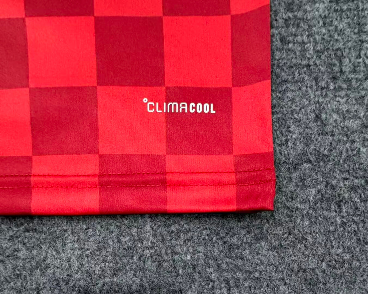 27/28 Liverpool home fan jersey checkerboard fabric detail