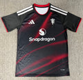 27/28 Manchester United away fan jersey front view in black and red