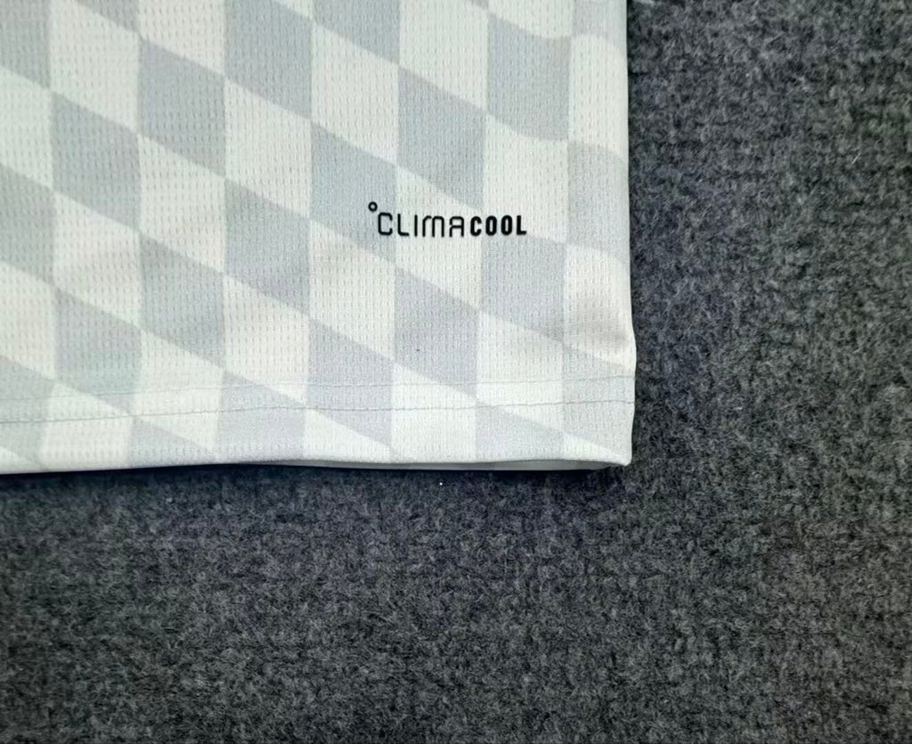27/28 Real Madrid home fan jersey tonal fabric detail